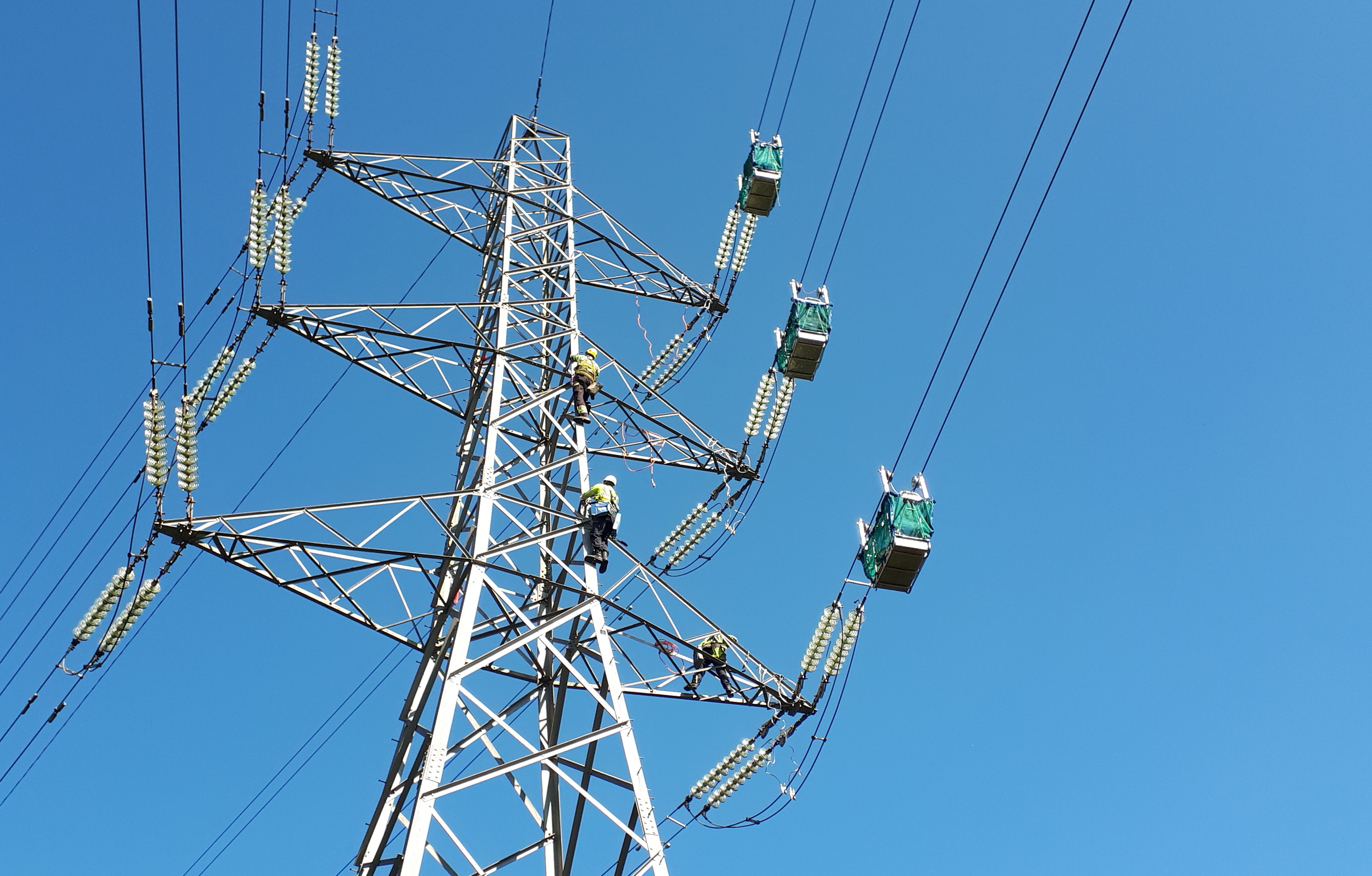 Engineers working at height on tower